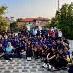 Tim Dafam Pacific Caesar Surabaya foto bersama anak-anak UPTD Kampung Anak Negeri Kalijudan usai senam bersama peringatan HAORNAS